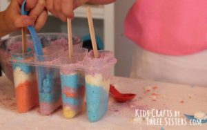 insert-popsicle-sticks-popsicle-molds